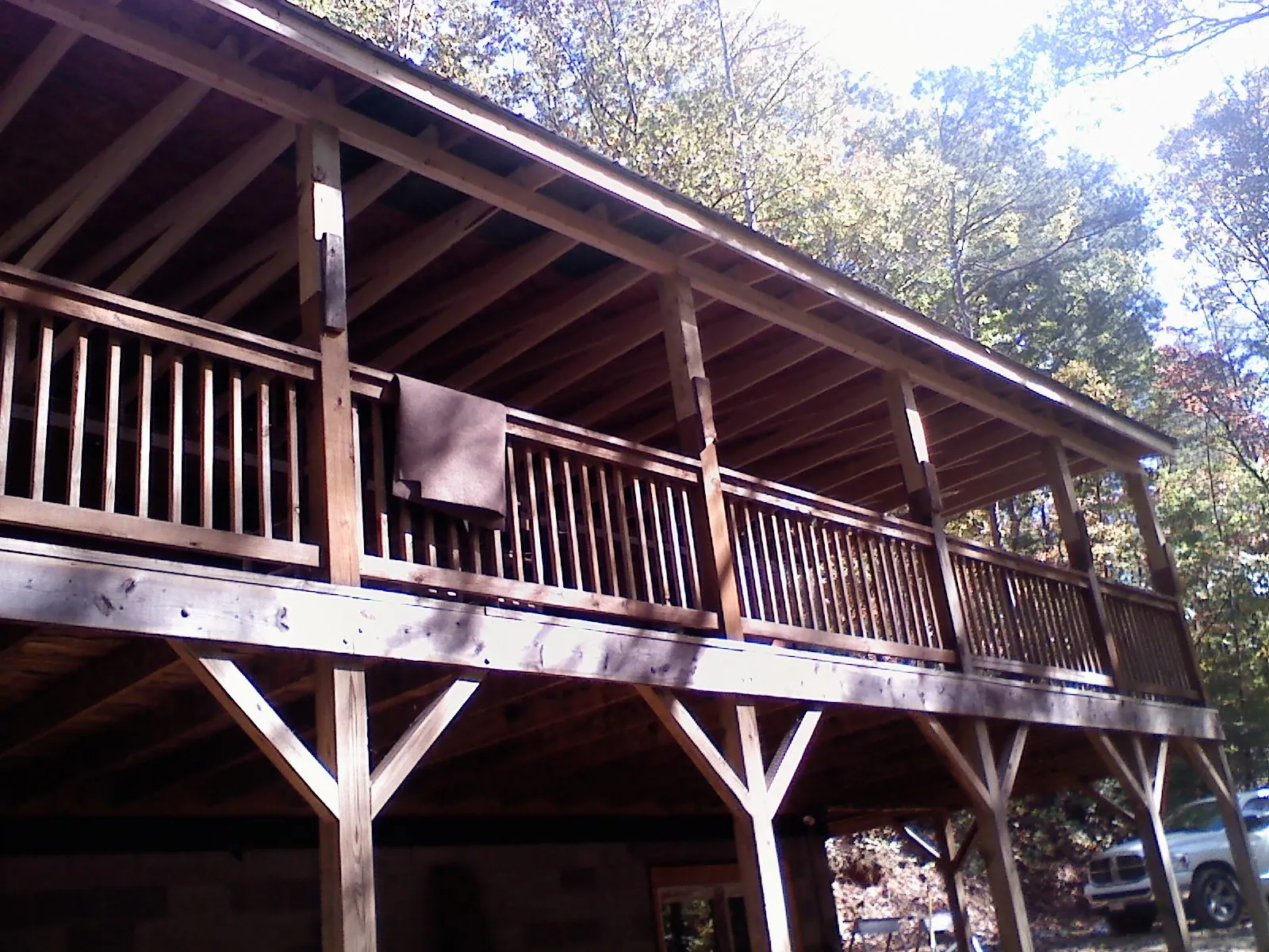 Timber framing under a new elevated porch and deck — Roof Leak Repair in Otterbein by Roofing Brothers